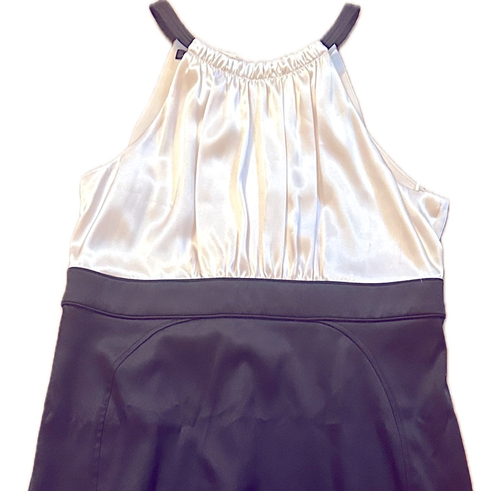 Jones wear satin cream and black midi dress.